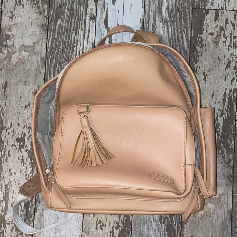 Skip Hop diaper backpack in camel cream tan color